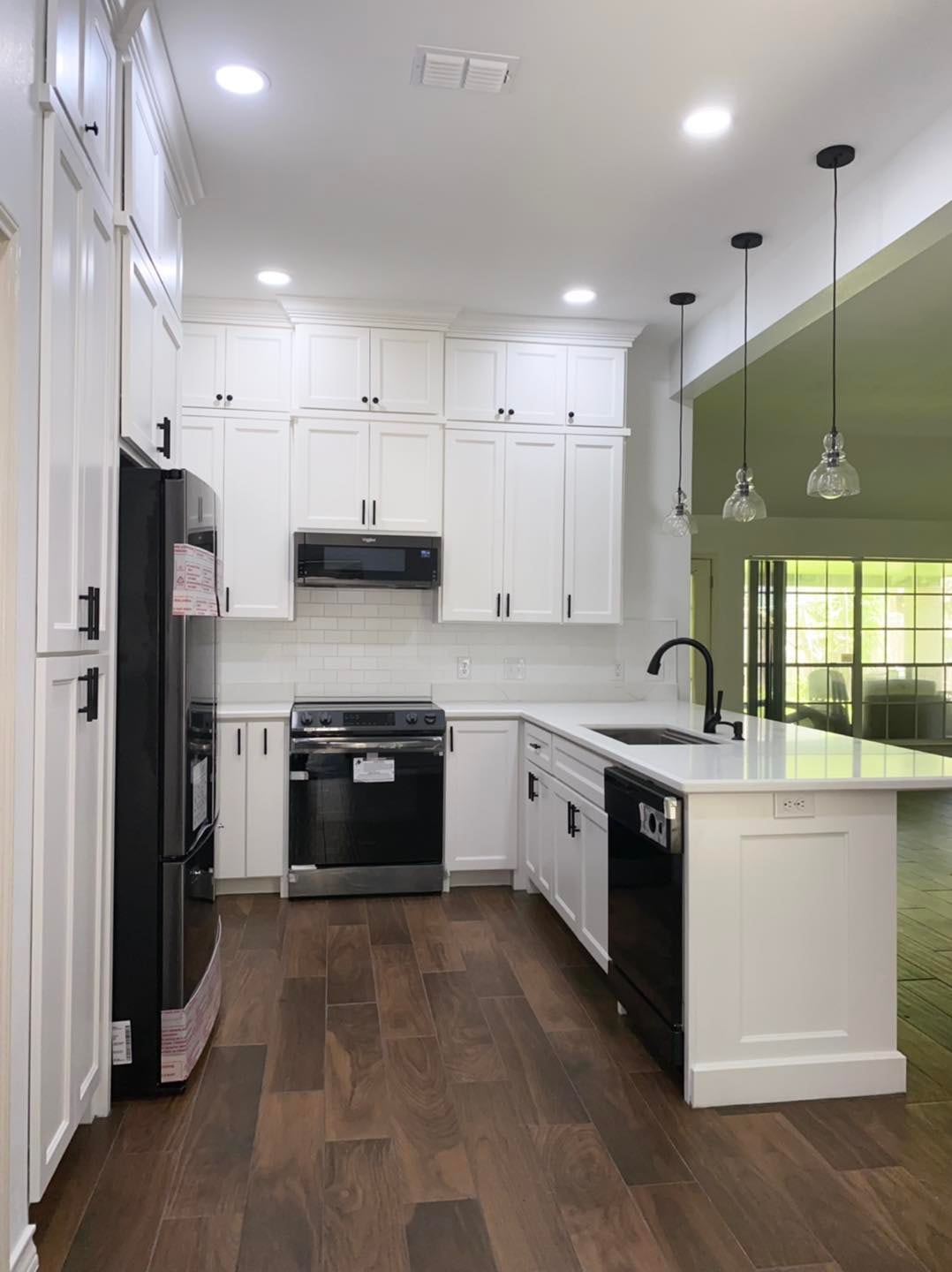 Kitchen Remodel — White Shaker & Black Appliances